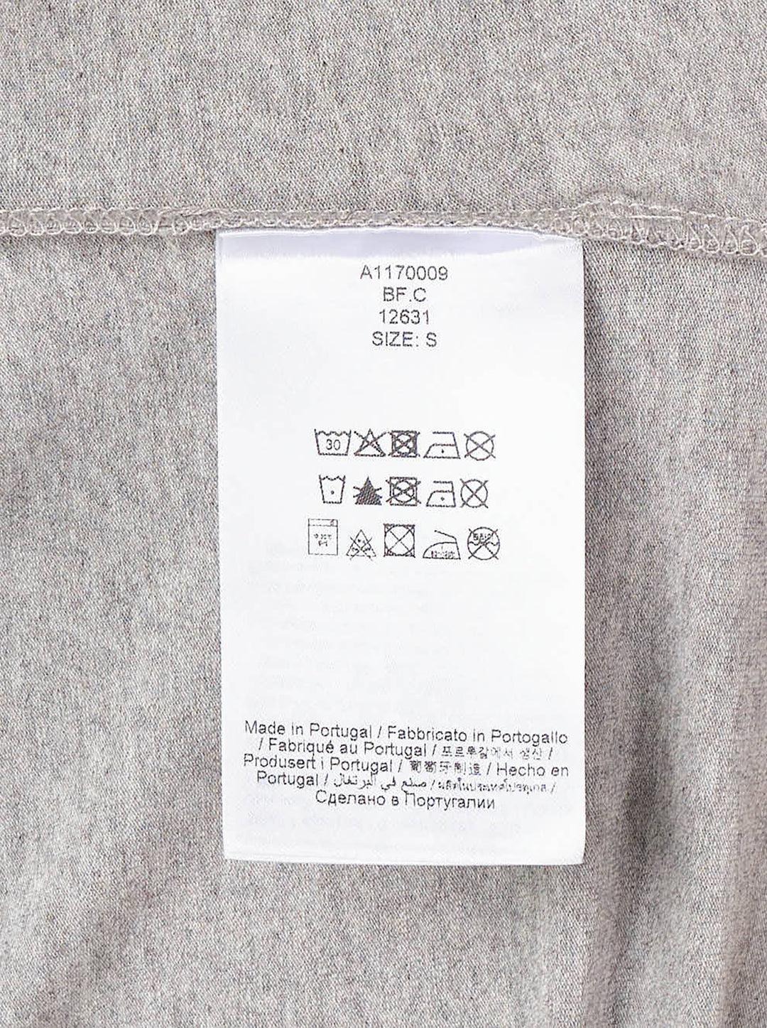 Ganni Heavy Stretch Cotton Draped Top in grey marl with long sleeves, crew neck, and asymmetric ruched waist detail - view 3