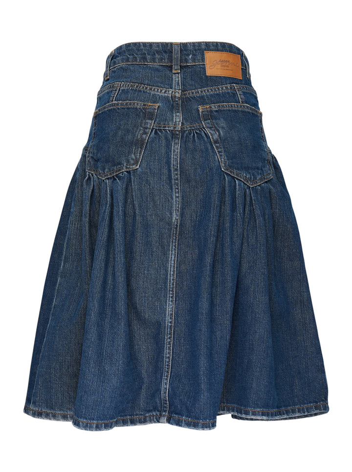 Ganni Slub Mix Denim Midi Skirt in washed indigo, featuring a high waistband, gathered tier seam, front patch pockets with gold rivets, and a full A-line silhouette with contrast orange topstitching - view 2