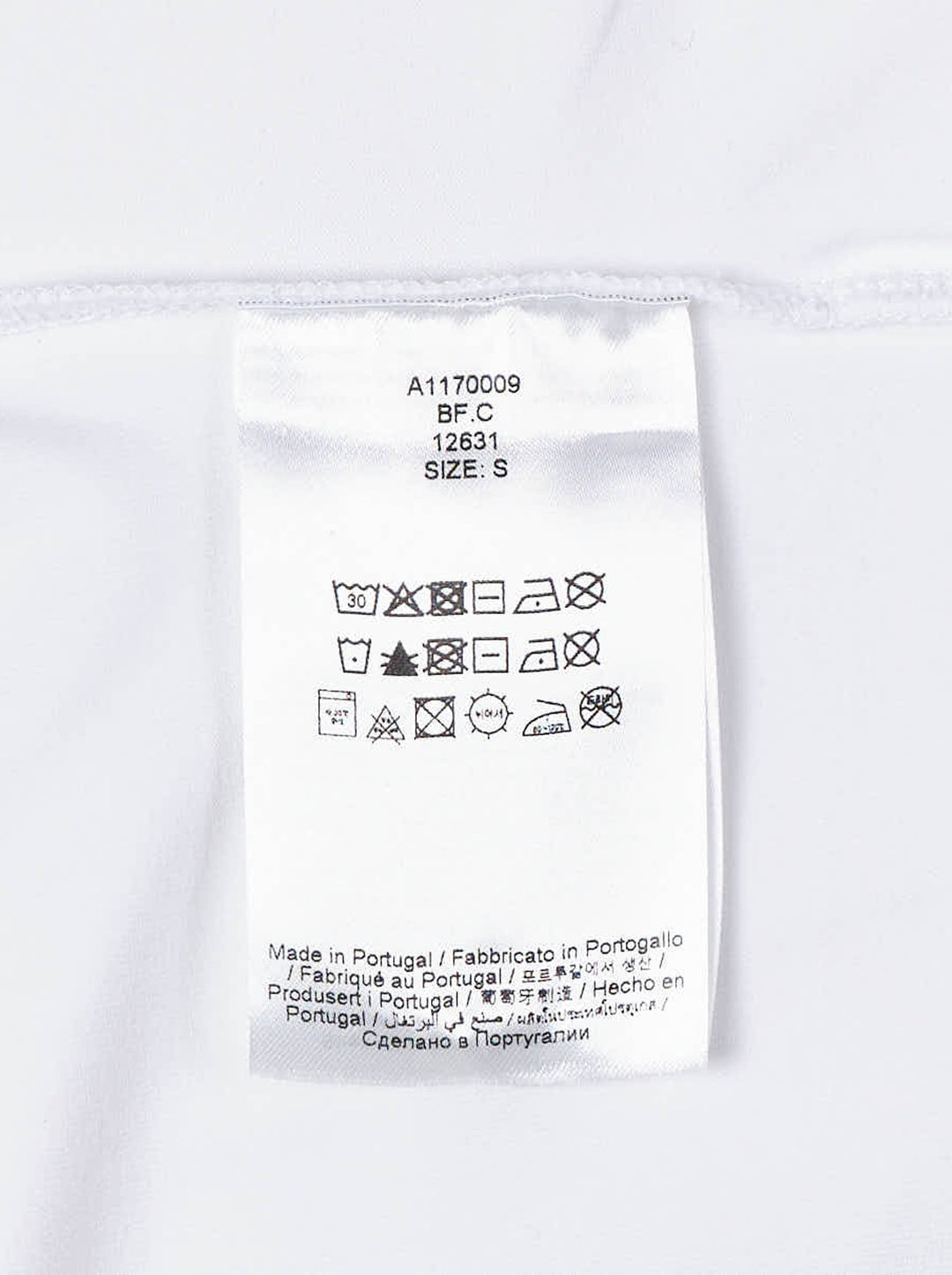 White long sleeve polo top with pointed collar, crystal buttons and ruched side draping - view 4