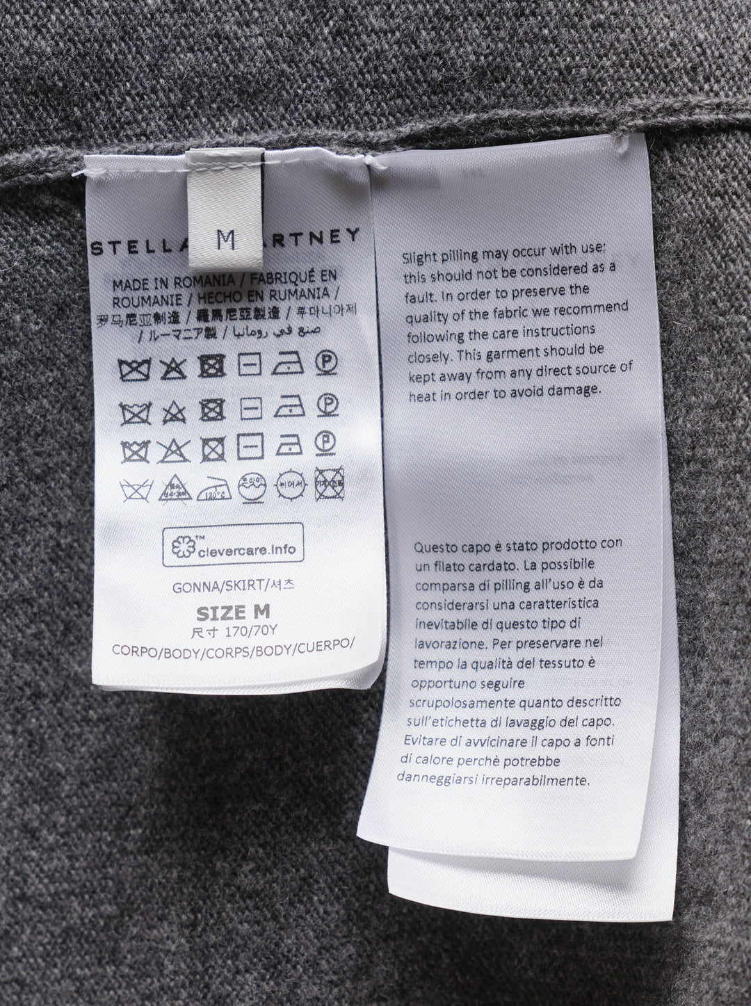 Stella McCartney Wool Knit Pencil Skirt in heathered grey, featuring a wide ribbed high waistband and slim midi-length silhouette - view 3