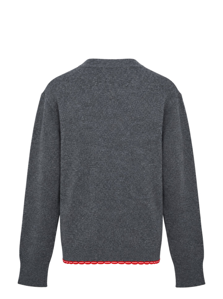 Stella McCartney heather grey wool jumper with multicolour crochet heart appliqué at the chest and red scalloped logo hem trim, front view - view 2