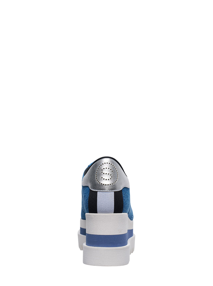 Stella McCartney Sneakelyse flatform sneaker in vintage washed blue denim with embroidered logo, silver heel counter, and a stacked white and blue striped platform sole with serrated tread - view 3