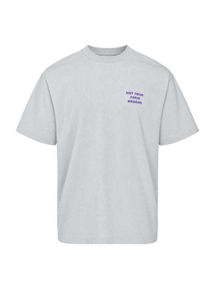 Drôle de Monsieur Not From Paris Madame pale grey oversized cotton tee with purple slogan print on the chest