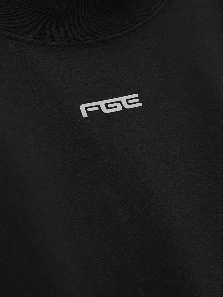 Fear of God ESSENTIALS women's slim mockneck tee in black with ribbed high neck, short sleeves and small white logo at the centre chest - view 3