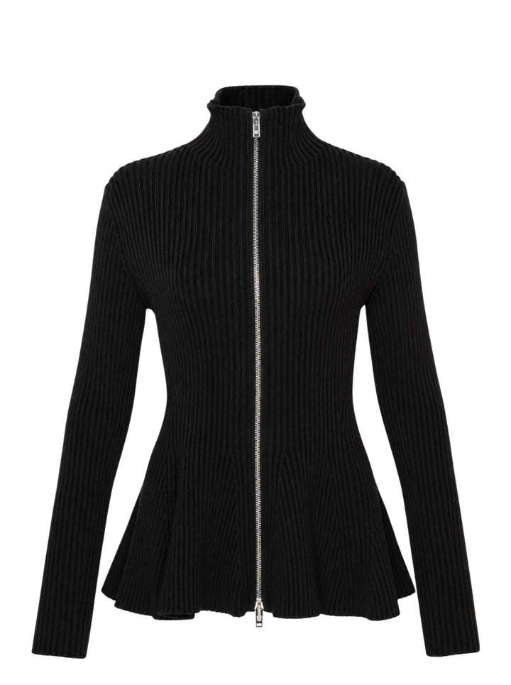 Alaïa Engineered Rib Peplum Cardigan in black with full-length silver zip, high mock neck, and flared peplum hem