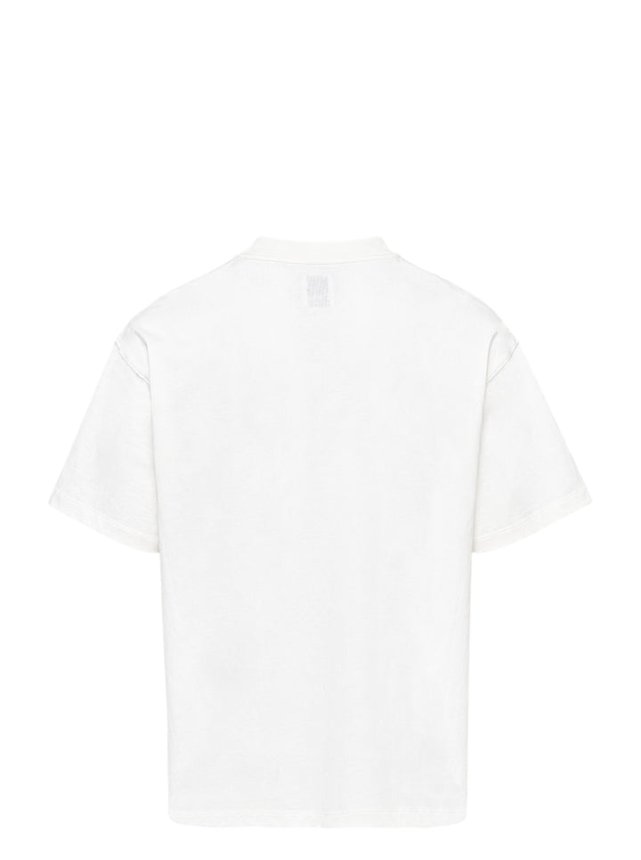 The Fluffadoos Ruby Name Story Tee in white, featuring a large graphic of the ruby-red furry Ruby character with pearl accessories and cursive 'Ruby' script lettering on the front - view 2