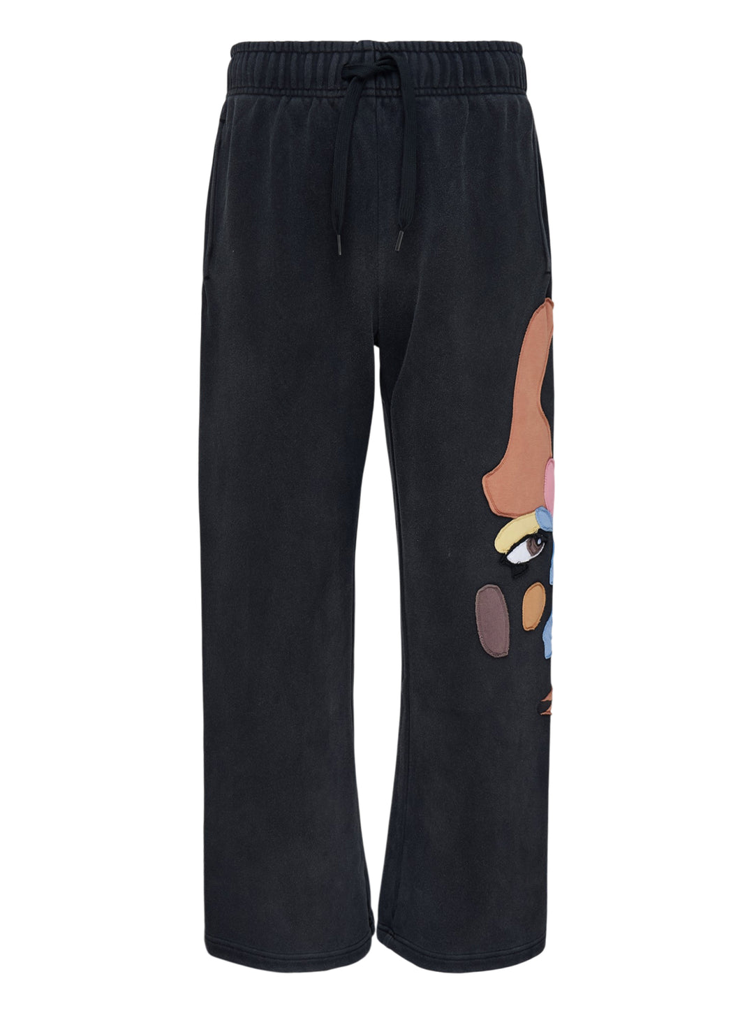 KidSuper Studios Side Eye Face washed black sweatpants with colourful patchwork appliqué face and drawstring waist