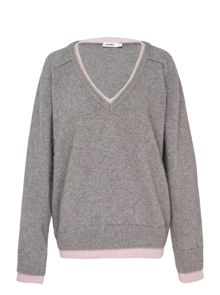 Glowny Raccoon Hazy Layered V-Neck Sweater in heather grey with blush pink contrast trim at the neckline, hem, and cuffs, displayed on a white background