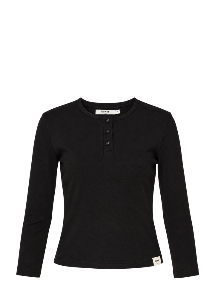 Glowny Long Sleeve Button Tee in black, featuring a short tonal button placket at the neckline, ribbed round collar, and a fitted jersey silhouette with woven brand label at the hem