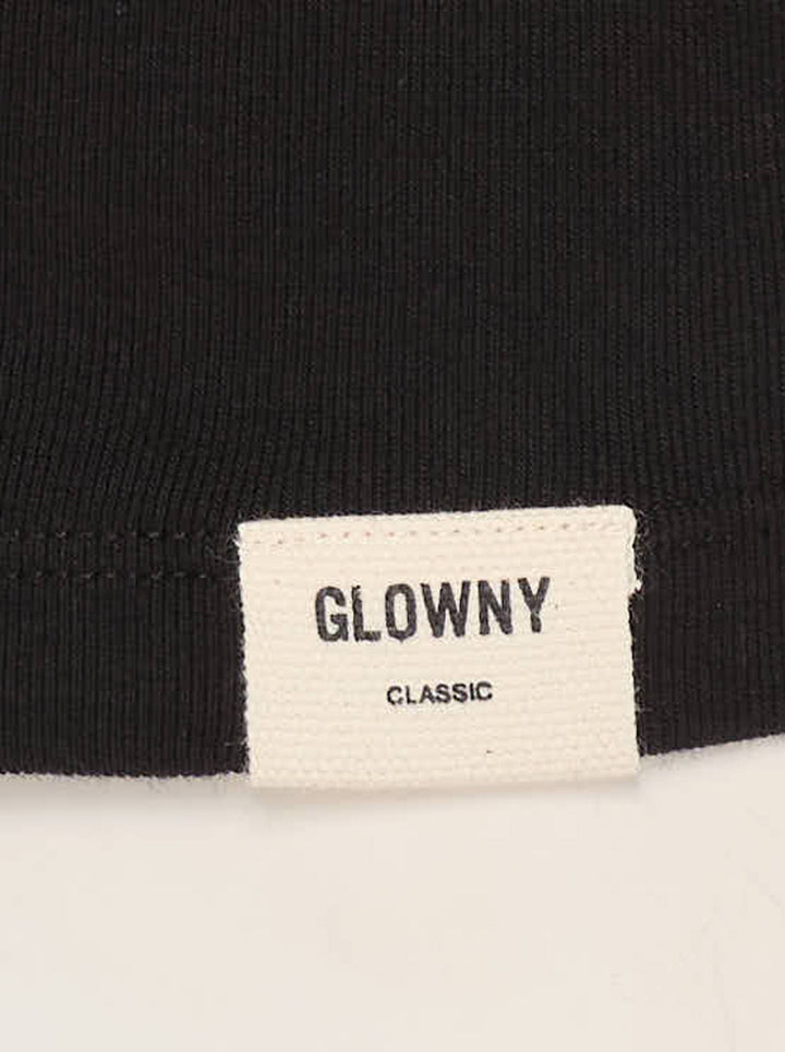 Glowny Classic Tank Top in black, featuring a square neckline, thin straight straps, fitted silhouette, and a woven Glowny label at the hem, photographed flat on a white background - view 4
