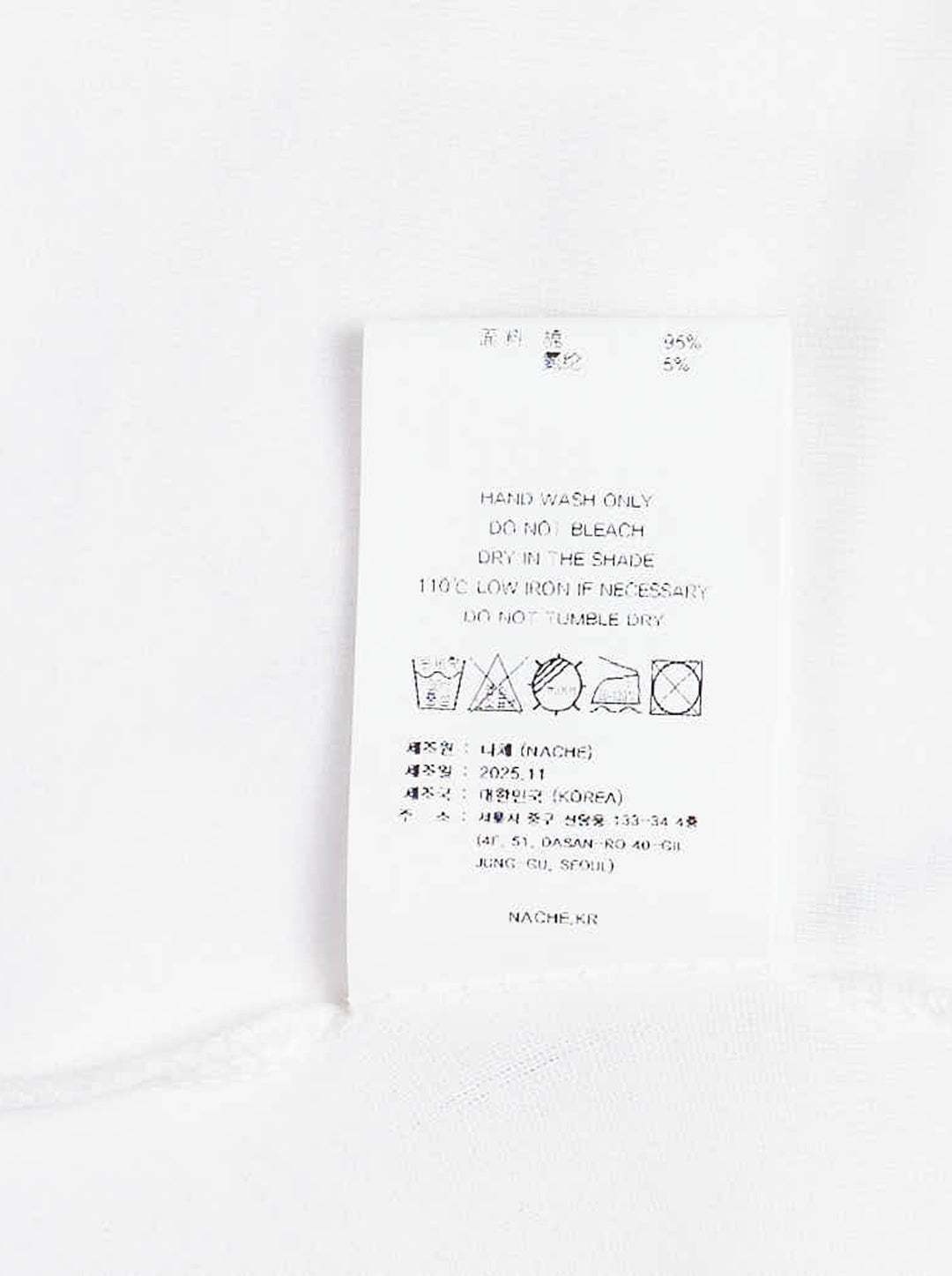 White Nache slim fit long sleeve top with a distorted black typographic print and flared cuffs - view 3