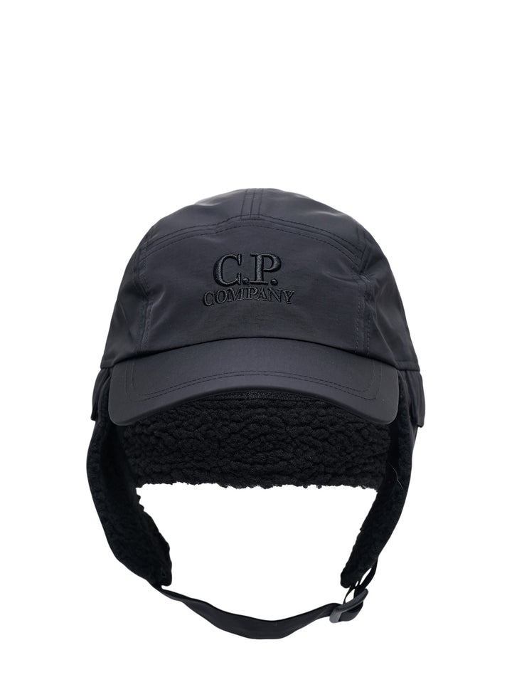 C.P. Company black baseball cap with embroidered logo and fleece-lined ear flaps with adjustable chin strap