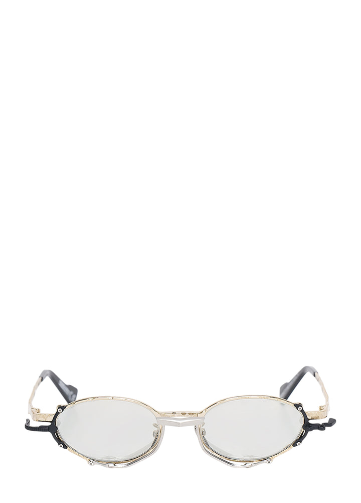 Kuboraum oval glasses with hammered gold-tone metal frame, black hardware accents and light mirrored lenses, front view