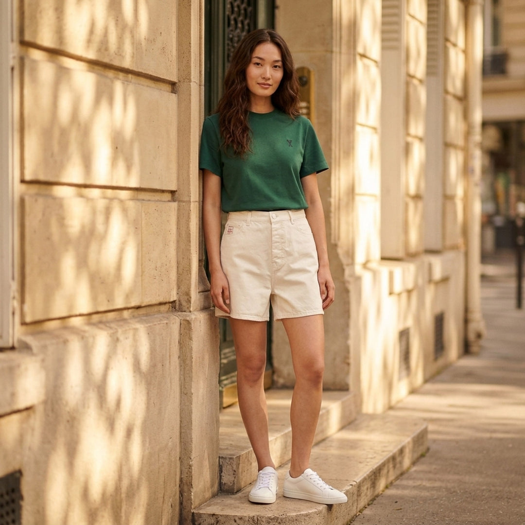AMI forest green short-sleeve crew neck T-shirt with a small black Ami de Cœur embroidered logo at the chest - lifestyle
