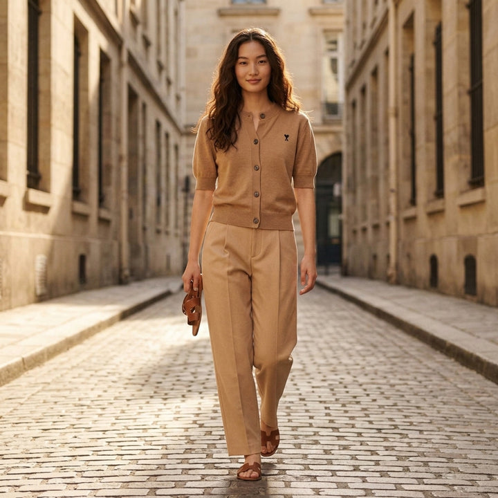 Ami Alexandre Matiussi short sleeve camel knit cardigan with button-through front, ribbed trims, and embroidered Ami de Cœur logo on the chest - lifestyle