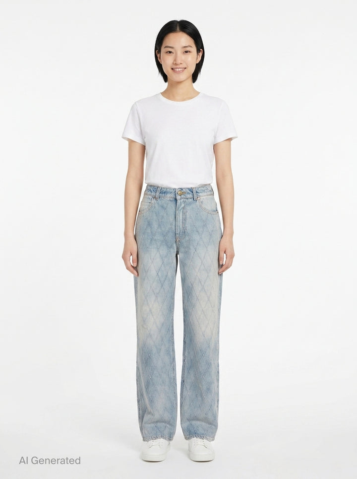 Balmain Straight Quilted Denim Jeans in light blue acid wash with all-over diamond stitching, straight-leg silhouette, and gold-tone hardware - front
