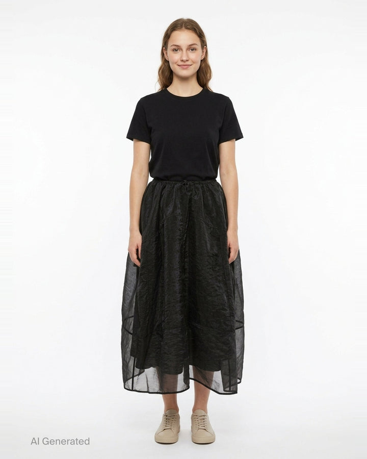 Cecilie Bahnsen Liquid Myrtia Skirt in black crinkled organza with gathered elasticated waistband, voluminous balloon silhouette, and layered sheer asymmetric hem - front