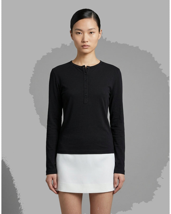 Black long sleeve cotton jersey Henley top with round neckline and five-button placket by Club21 Collection - front