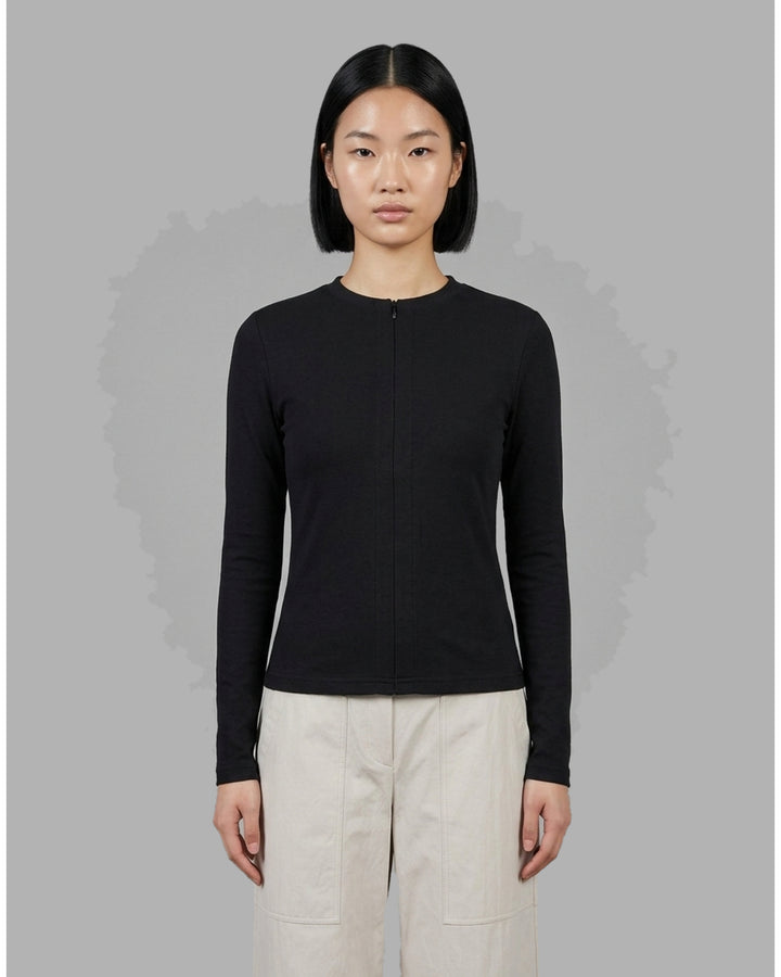 Black long sleeve zip-front top in high stretch modal jersey with a crew neckline and vertical front seams - front