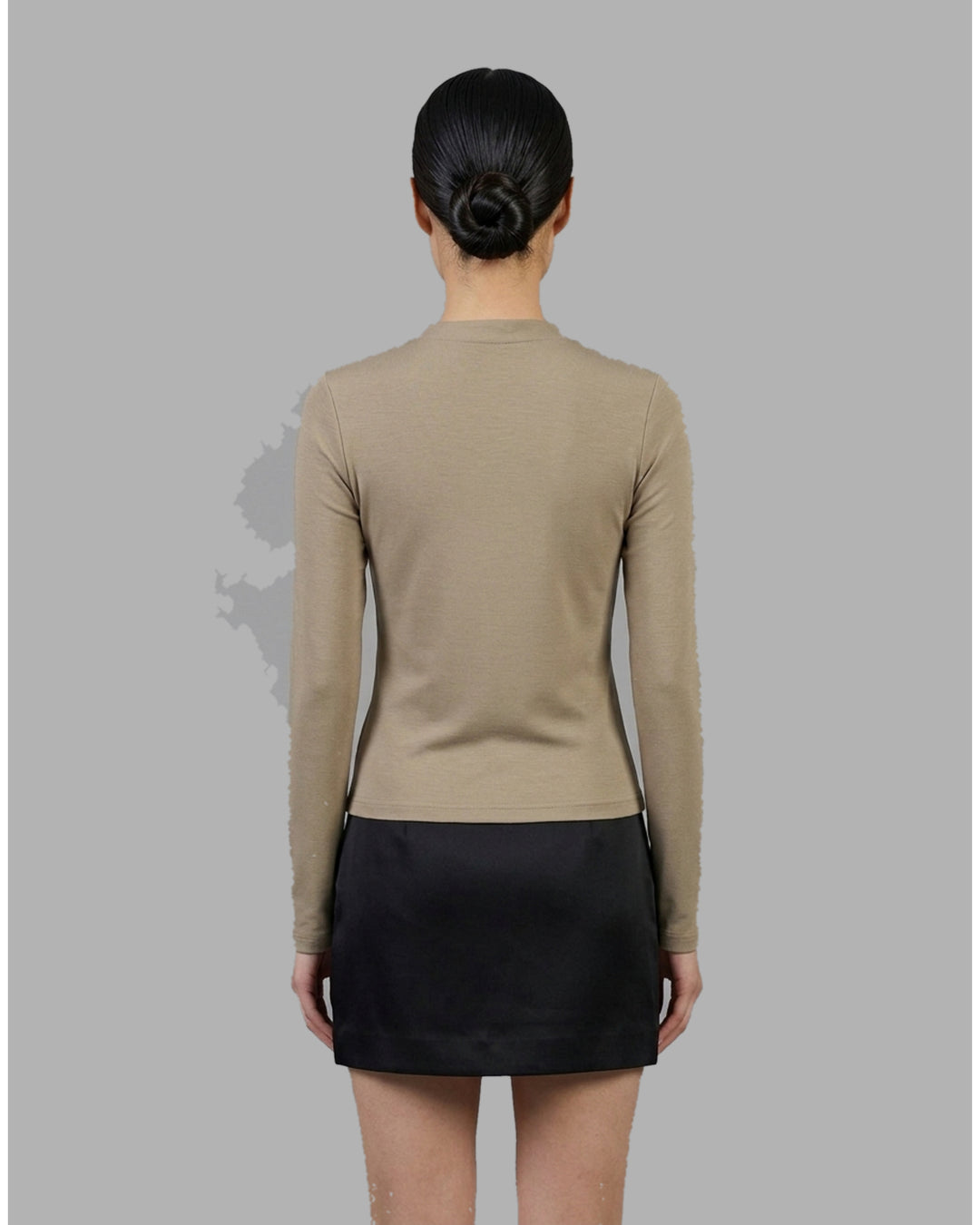 Black long sleeve zip-front top in high stretch modal jersey with a crew neckline and vertical front seams - back