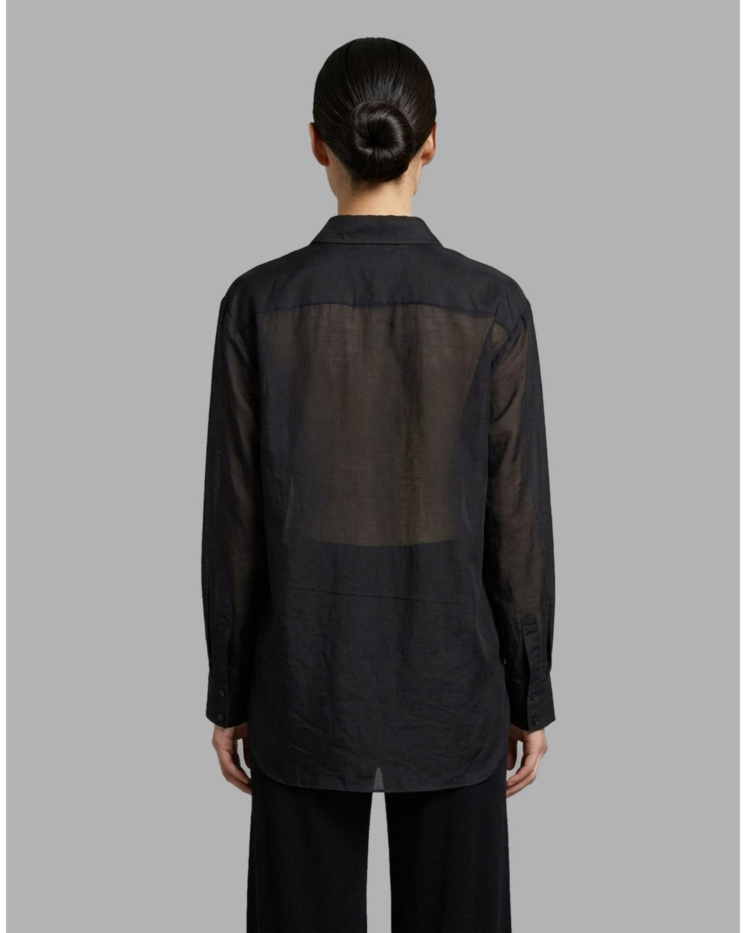 Black sheer silk-cotton Soline shirt with pleated tuxedo-style bib, pointed collar, concealed placket and long sleeves - back