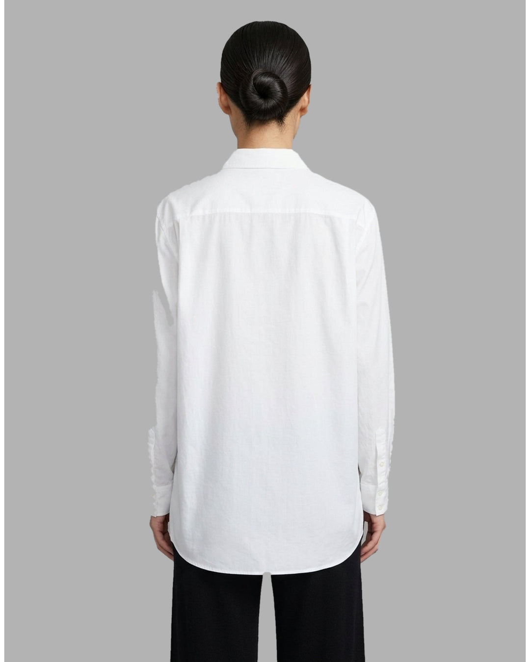 Black sheer silk-cotton Soline shirt with pleated tuxedo-style bib, pointed collar, concealed placket and long sleeves - back