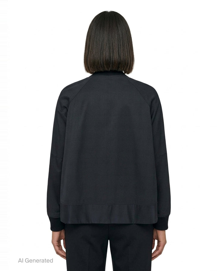 Comme des Garçons BLACK wool-blend bomber jacket in black with silver snap-button closure, ribbed collar, cuffs and hem, and two hip welt pockets - back