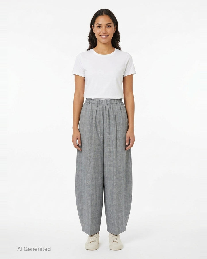 Enfold Checked Cocoon Pants in grey glen plaid with elasticated waistband, exaggerated wide-leg silhouette, and tapered hem — front view on white background - front