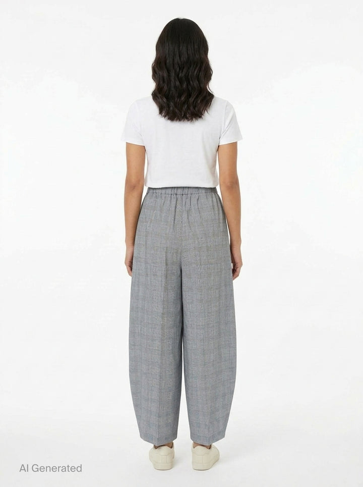 Enfold Checked Cocoon Pants in grey glen plaid with elasticated waistband, exaggerated wide-leg silhouette, and tapered hem — front view on white background - back