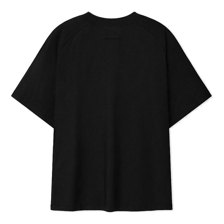 Fear of God Essentials Essential Raglan Tee in black with tonal FGE logo on the chest and ribbed crewneck, shown flat from the front - packshot