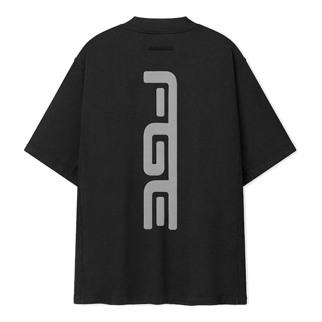 Fear of God Essentials Racing Panelled Modern Tee in black with a mock neck, oversized short sleeves, tiered hem and grey "Fear of God Racing" graphic on the chest - packshot