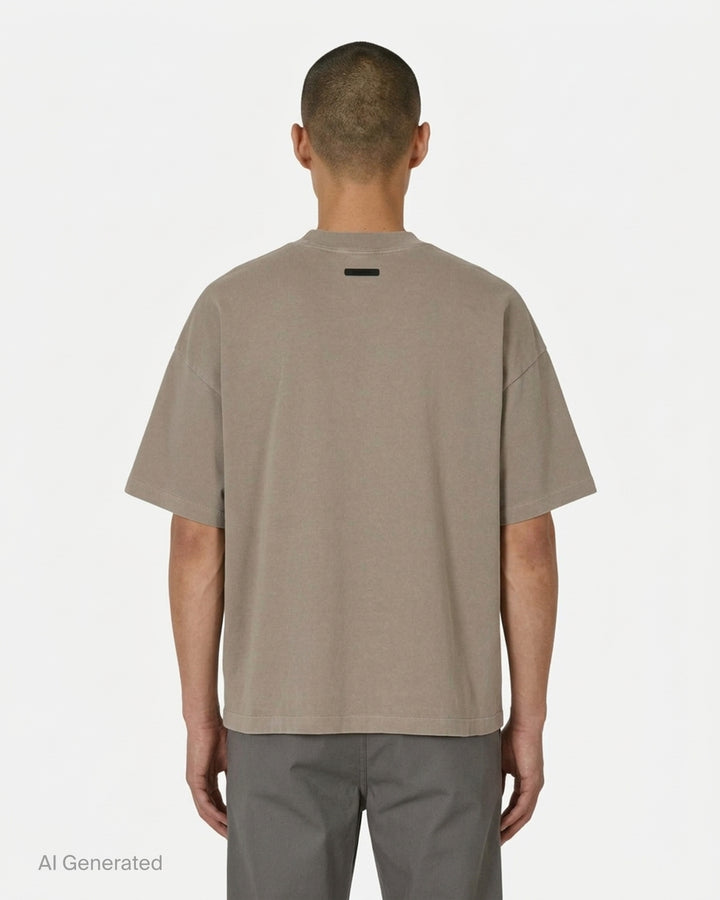 Fear of God Essentials Signature 90's Short Sleeve Tee in washed charcoal with oversized boxy fit and tonal embroidered script logo on the chest - back