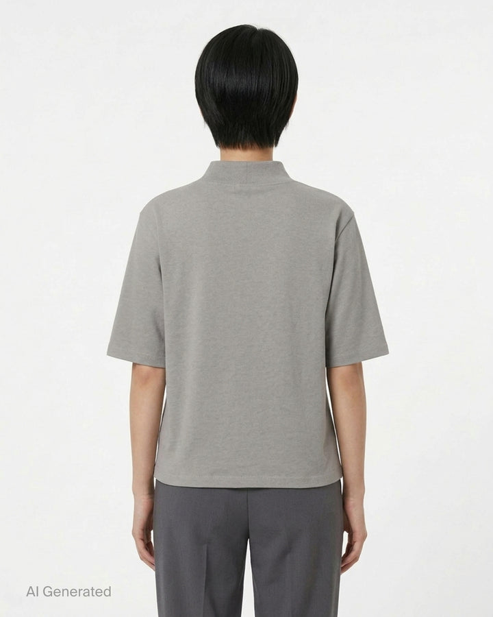 Fear of God ESSENTIALS women's slim mockneck tee in black with ribbed high neck, short sleeves and small white logo at the centre chest - back