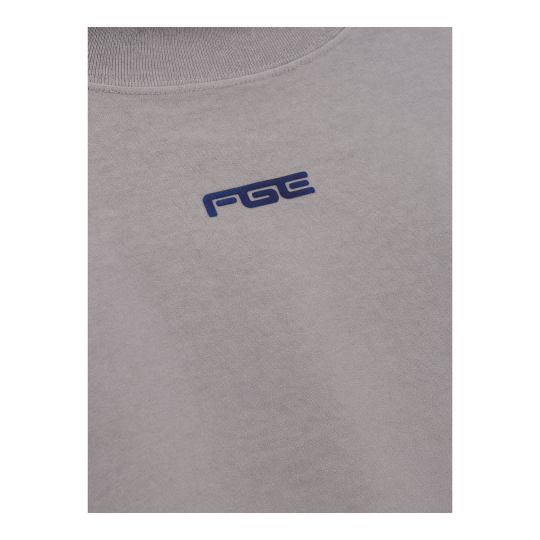 Fear of God ESSENTIALS women's slim mockneck tee in black with ribbed high neck, short sleeves and small white logo at the centre chest - packshot