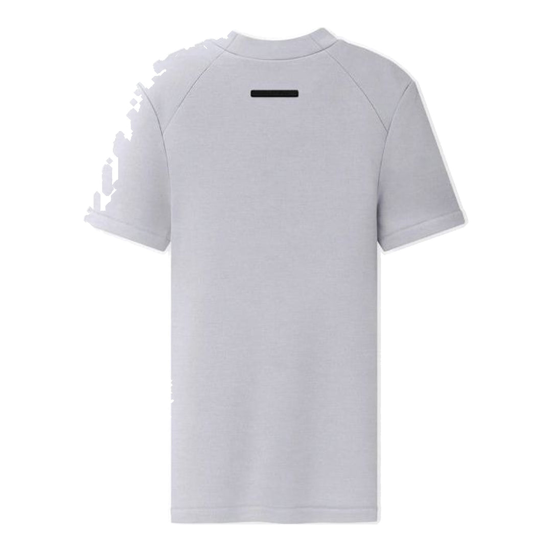 Fear of God Essentials women's tight tee in heathered taupe-grey with mock neckline and short sleeves, shown flat against a white background - packshot
