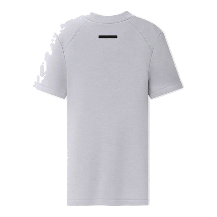 Fear of God Essentials women's tight tee in heathered taupe-grey with mock neckline and short sleeves, shown flat against a white background - packshot