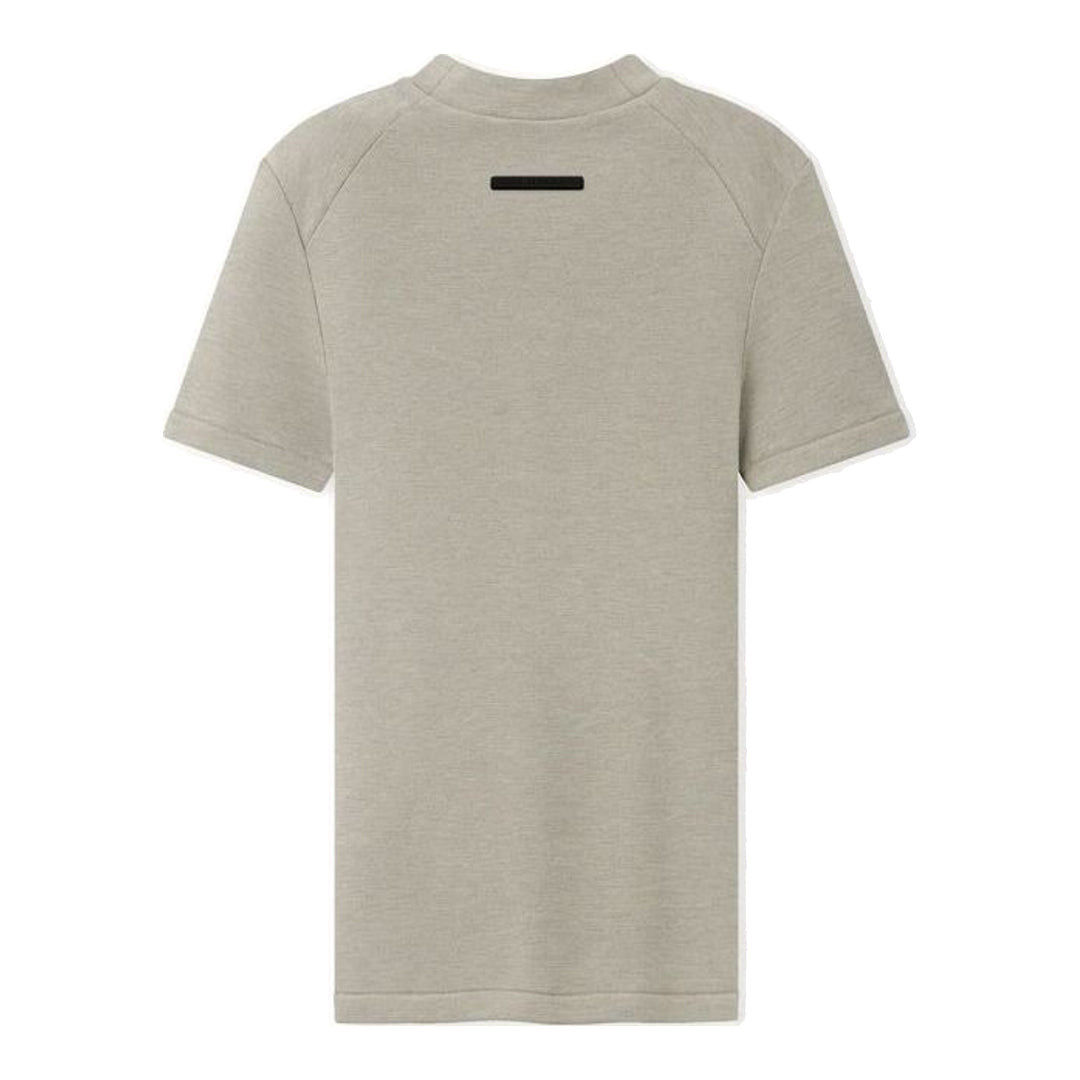 Fear of God Essentials women's tight tee in heathered taupe-grey with mock neckline and short sleeves, shown flat against a white background - packshot