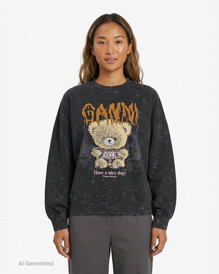Ganni Teddy Forest Crewneck Sweatshirt in acid-washed black with dripping orange Ganni lettering and teddy bear mascot graphic on the front - front