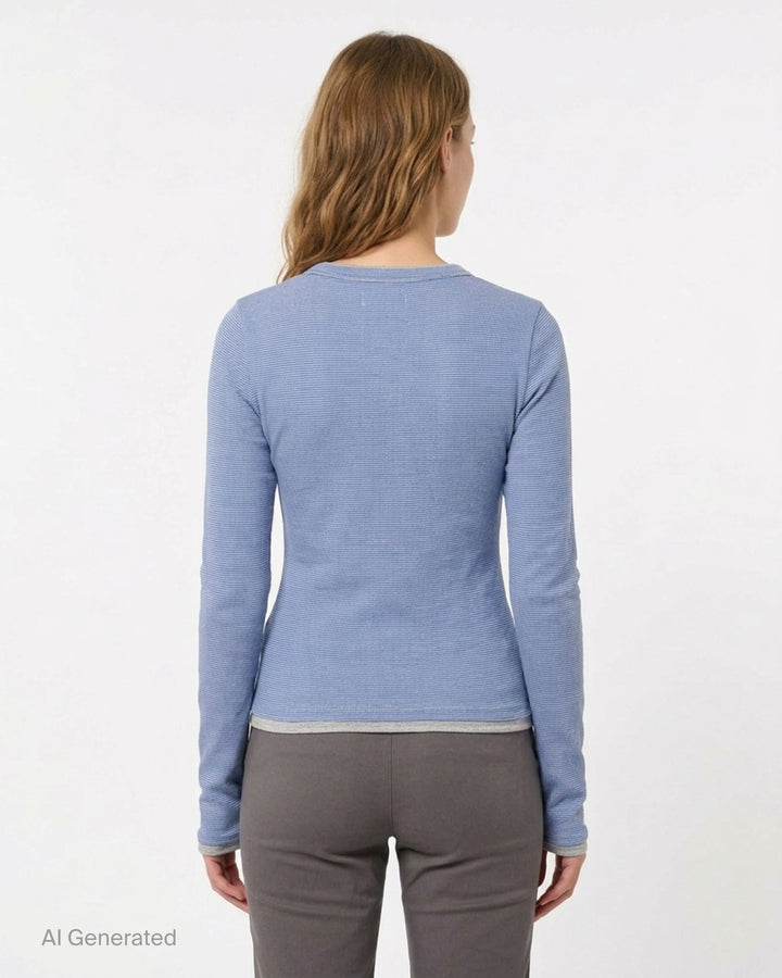 Glowny Roan Layered Long Sleeve Tee in blue and grey fine stripe with contrast grey neckline and cuff trim, three-button henley placket, and flared sleeve hem - back
