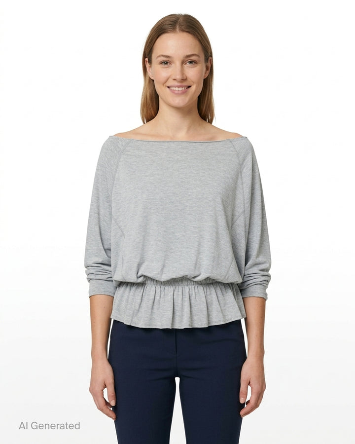 Glowny Sway Shirring Long Sleeve Blouse in heather grey, featuring a relaxed batwing silhouette, broad boat neckline, and an elasticated shirred frill hem - front