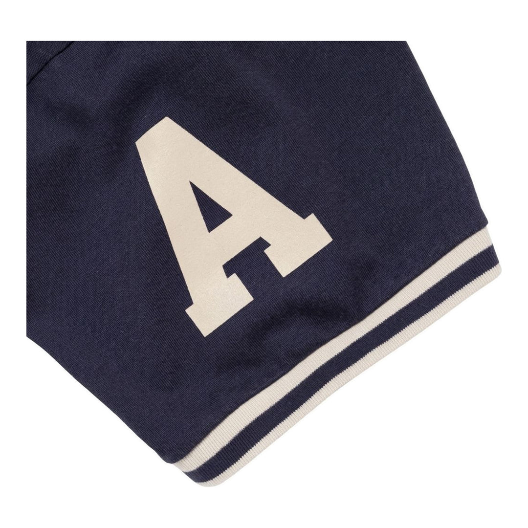 Human Made Athletic Short Sleeve Tee in navy with cream contrast ringer collar and cuff trim, varsity number on sleeve, and Human Made chest logo - packshot