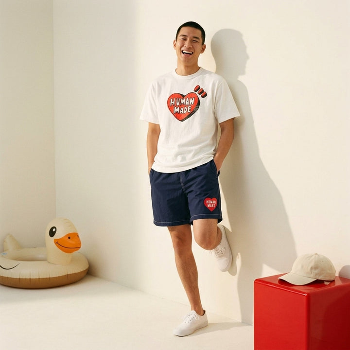 Human Made black short sleeve crew neck t-shirt with a large red hand-drawn heart graphic and 'Human Made' bubble lettering on the chest - lifestyle
