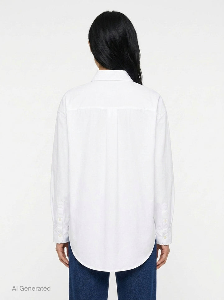 Jacquemus La Chemise Citta white woven button-down shirt with spread collar, long sleeves, and tonal buttons on a white background - back