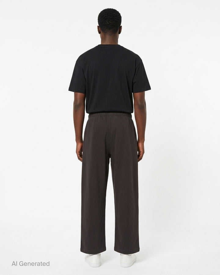 Jacquemus Le Jogging Montaigne sweatpants in heathered oatmeal fleece with an elasticated waistband and wide straight leg, front view - back