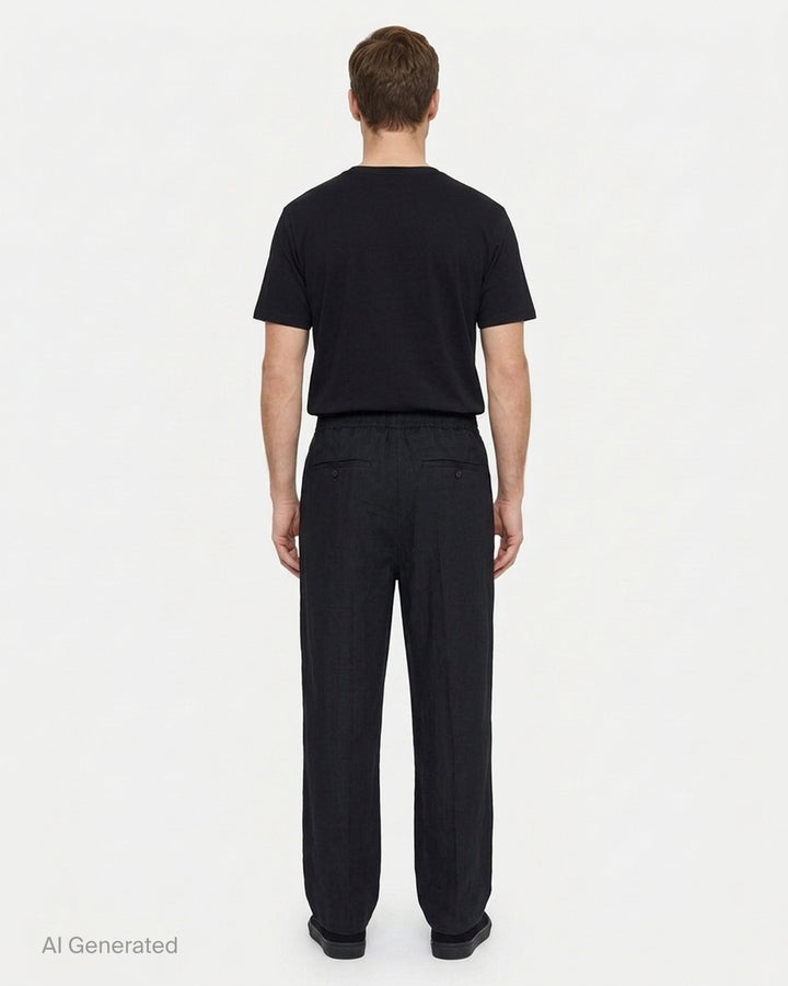Jacquemus Le Pantalon Miami black wide-leg trousers with smocked elasticated waistband and pressed centre crease, front view - back