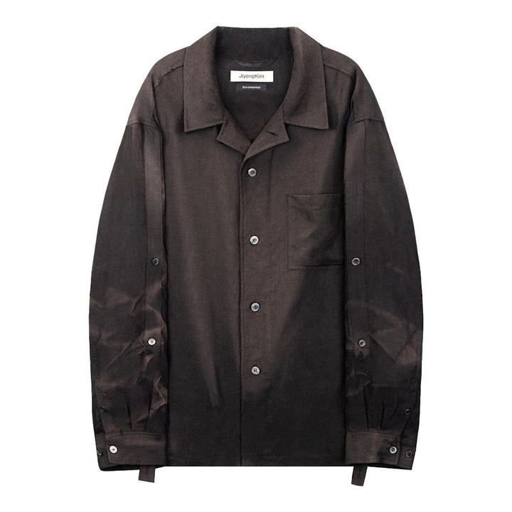 JiyongKim Sun-Bleached Strap Shirt in faded dark brown with open camp collar, chest pocket, button front and adjustable sleeve straps - packshot
