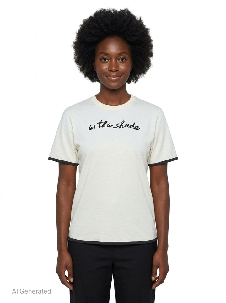 JW Anderson navy short sleeve t-shirt with red cursive 'in the shade' chest embroidery and contrast red sleeve and hem trim detailing - front