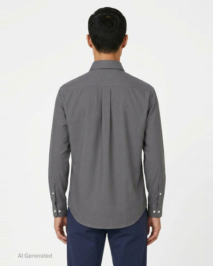 Lemaire Regular Long Sleeve Washed Cotton Shirt in slate grey, displayed flat against a white background, featuring a classic collar, white buttons, and a chest patch pocket - back
