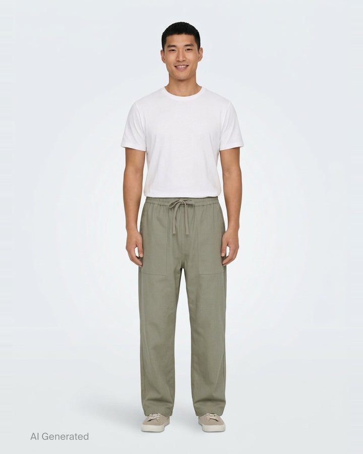 Maison Kitsuné Workwear Wide Leg Pants in blush beige with elasticated drawstring waist and front patch pockets, straight wide-leg silhouette, front view on white background - front