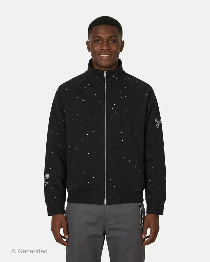 Mastermind black jersey track jacket embellished with scattered Swarovski crystals and crystal skull-and-crossbones motifs on the sleeves - front